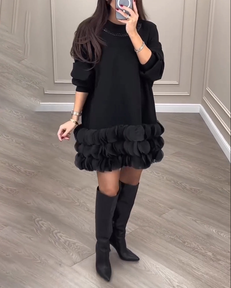 Elegantes Kleid mit Patchwork-Blütenblättern