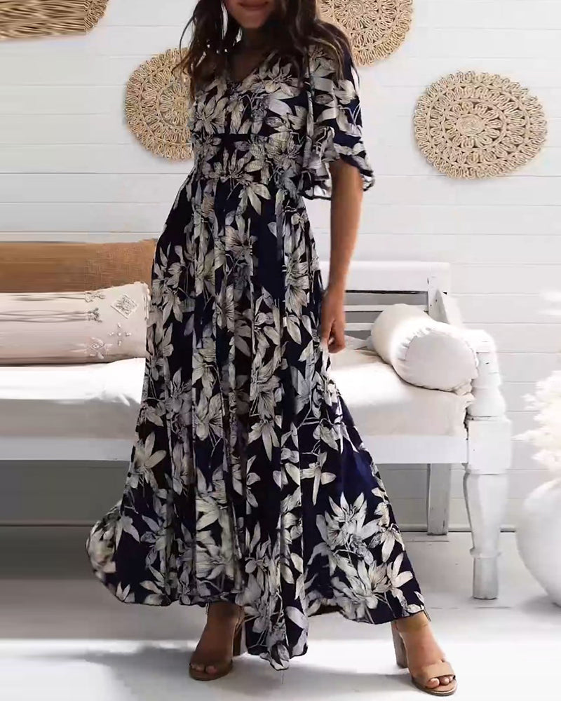 Elegantes florales Kleid mit halben Ärmeln