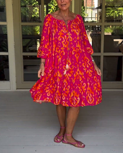 Lockeres Kleid mit Glockenärmeln und Druck