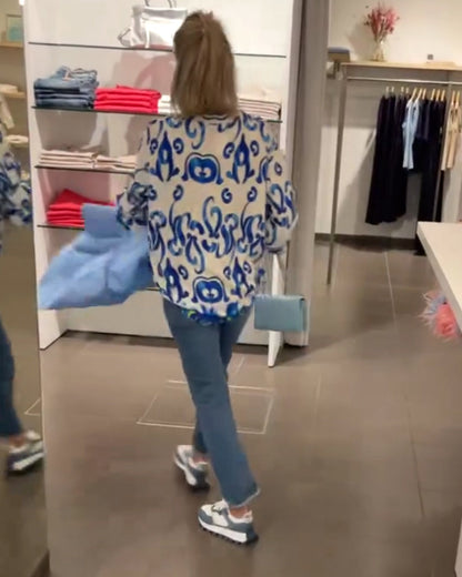 Elegantes langärmliges Oberteil mit bedrucktem V-Ausschnitt