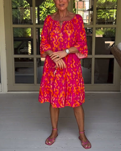 Lockeres Kleid mit Glockenärmeln und Druck