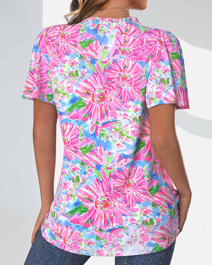 Kurzärmlige, blumige Bluse mit Knopfverschluss