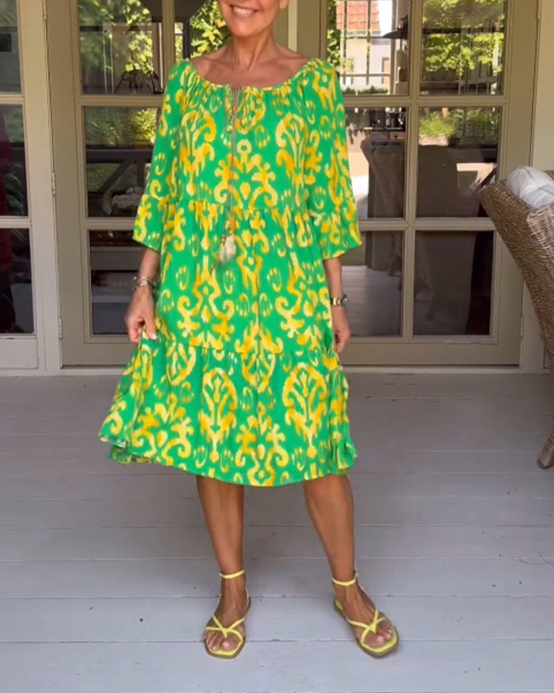 Lockeres Kleid mit Glockenärmeln und Druck