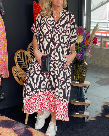 Bedrucktes V-Ausschnitt-Kleid