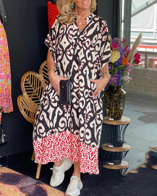 Bedrucktes V-Ausschnitt-Kleid