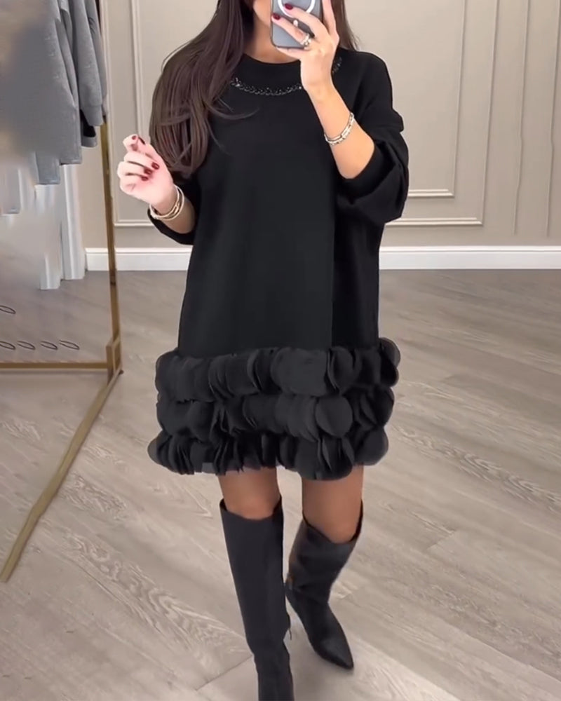 Elegantes Kleid mit Patchwork-Blütenblättern