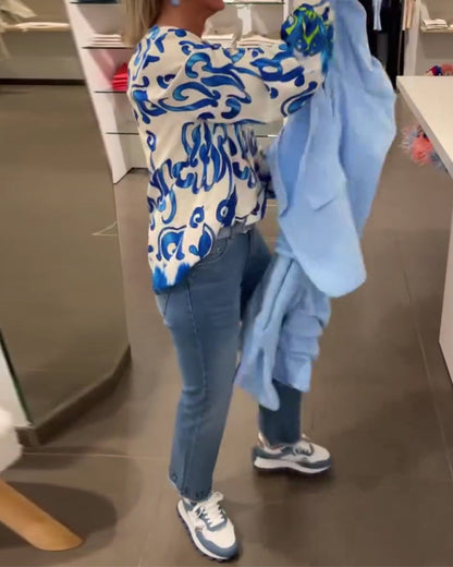 Elegantes langärmliges Oberteil mit bedrucktem V-Ausschnitt