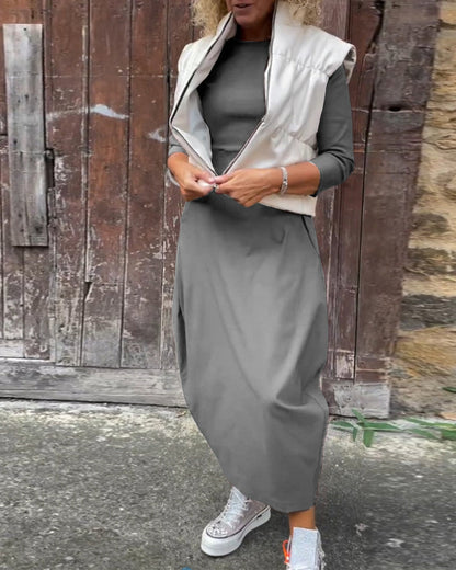 Einfaches, einfarbiges, elegantes Kleid mit langen Ärmeln und Taschen