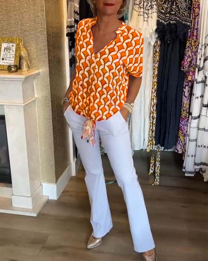 Kurzärmliges V-Ausschnitt bedrucktes Freizeitoberteil