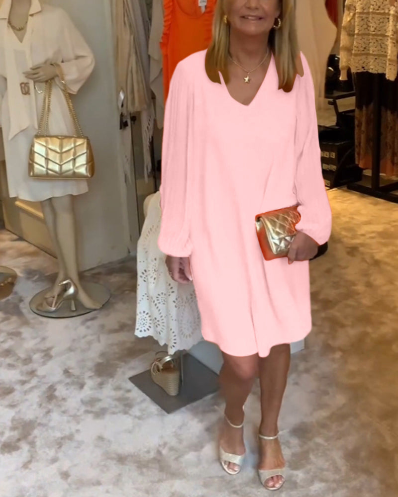 Einfarbiges Kleid mit Laternenärmeln und V-Ausschnitt