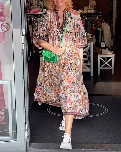 Elegantes langes Kleid mit V-Ausschnitt und Druck