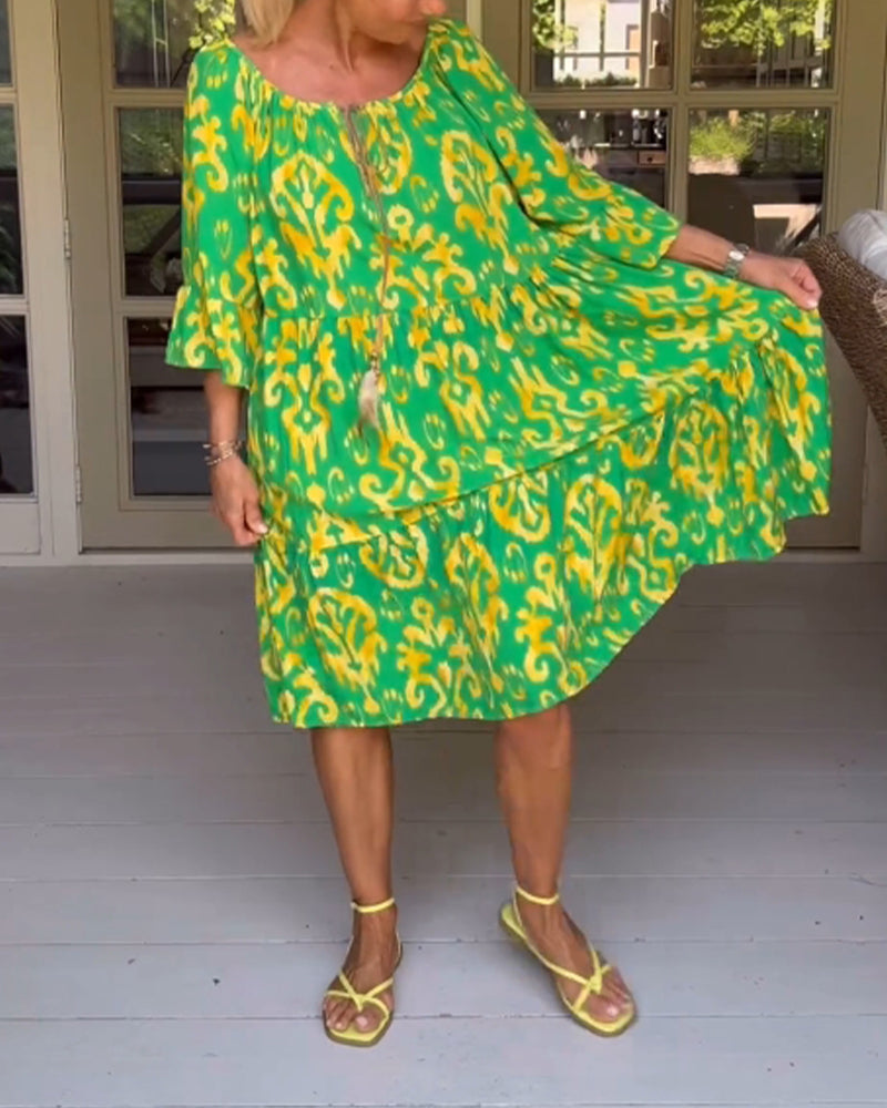 Lockeres Kleid mit Glockenärmeln und Druck