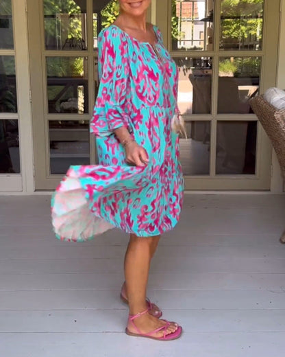 Lockeres Kleid mit Glockenärmeln und Druck