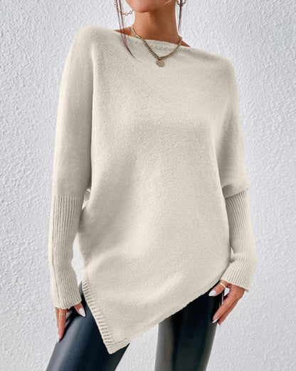 Einfarbiger Pullover mit unregelmäßigem Saum