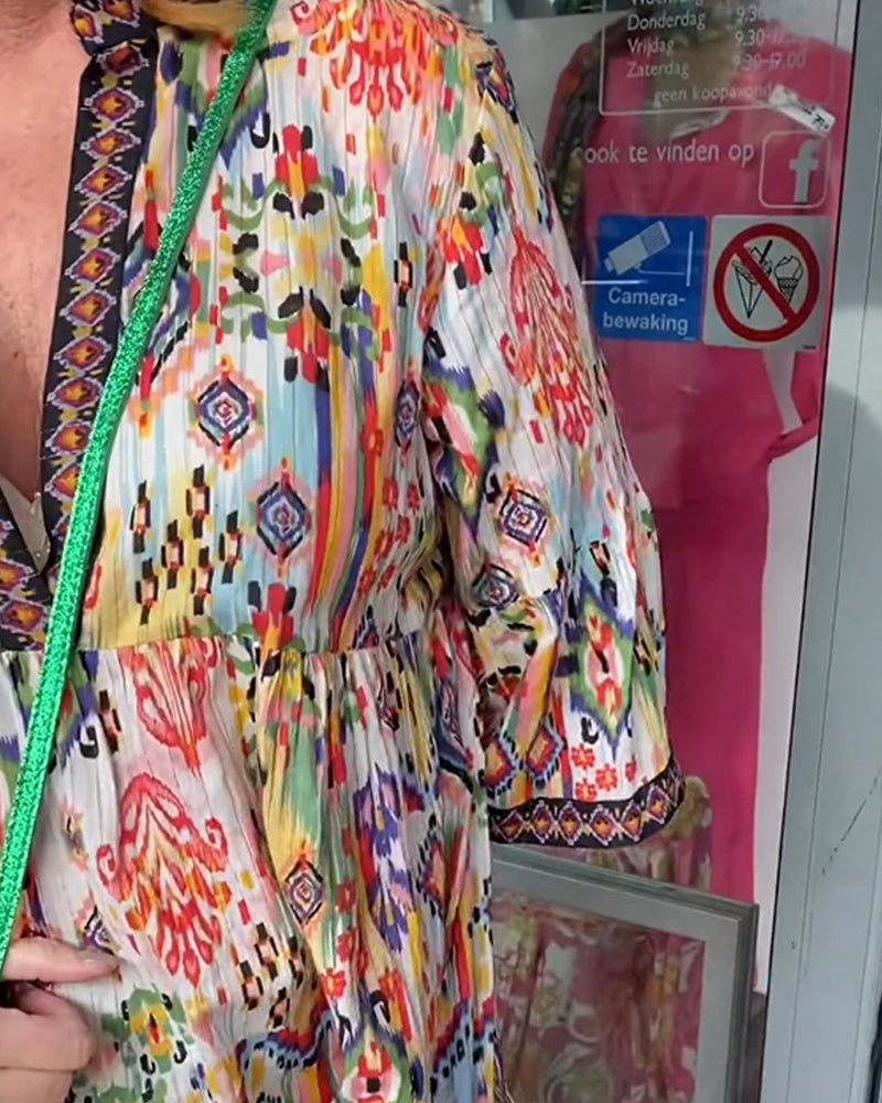 Elegantes langes Kleid mit V-Ausschnitt und Druck