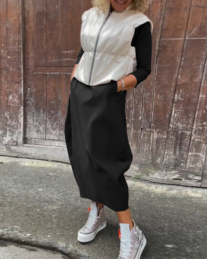 Einfaches, einfarbiges, elegantes Kleid mit langen Ärmeln und Taschen