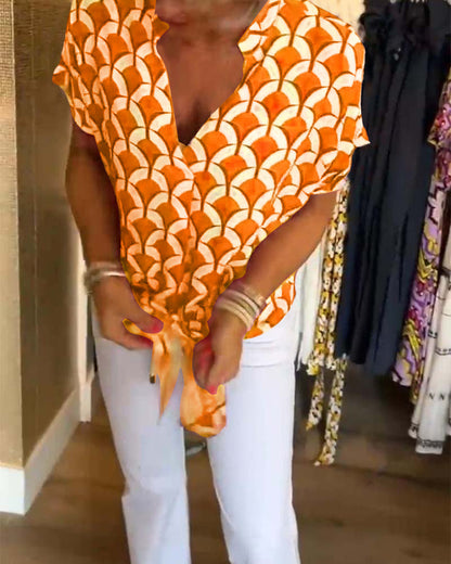 Kurzärmliges V-Ausschnitt bedrucktes Freizeitoberteil