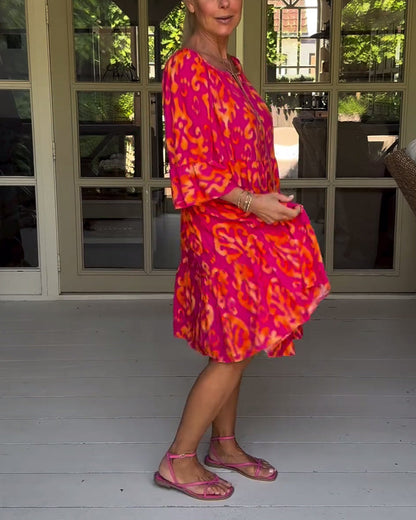 Lockeres Kleid mit Glockenärmeln und Druck