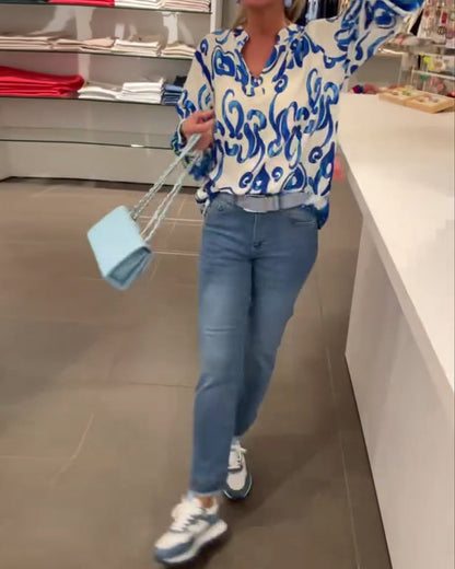 Elegantes langärmliges Oberteil mit bedrucktem V-Ausschnitt