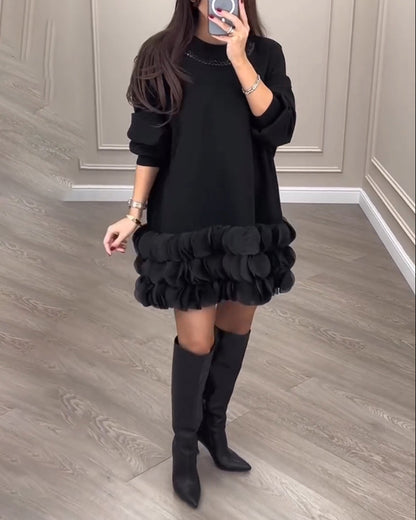 Elegantes Kleid mit Patchwork-Blütenblättern