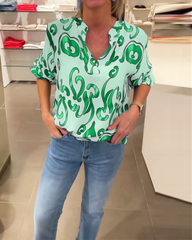 Elegantes langärmliges Oberteil mit bedrucktem V-Ausschnitt