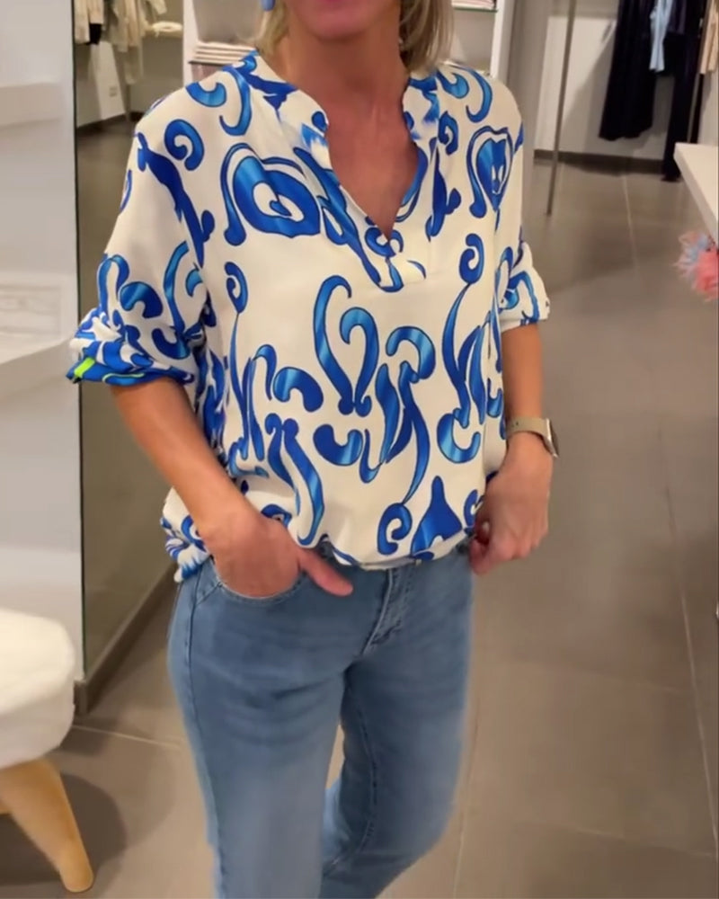 Elegantes langärmliges Oberteil mit bedrucktem V-Ausschnitt