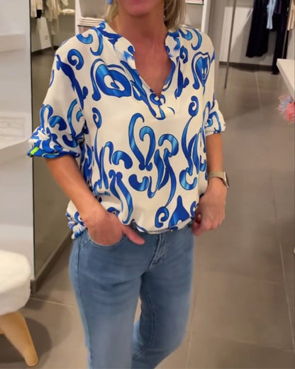 Elegantes langärmliges Oberteil mit bedrucktem V-Ausschnitt