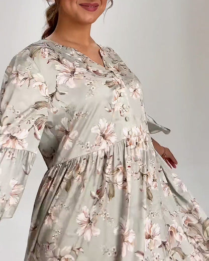 Kleid mit Glockenärmeln und Blumenmuster