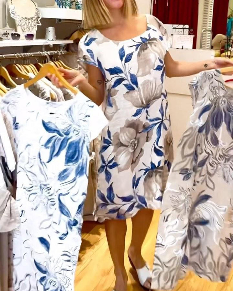 Elegantes kurzärmliges Kleid mit Blumenmuster