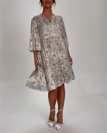 Kleid mit Glockenärmeln und Blumenmuster