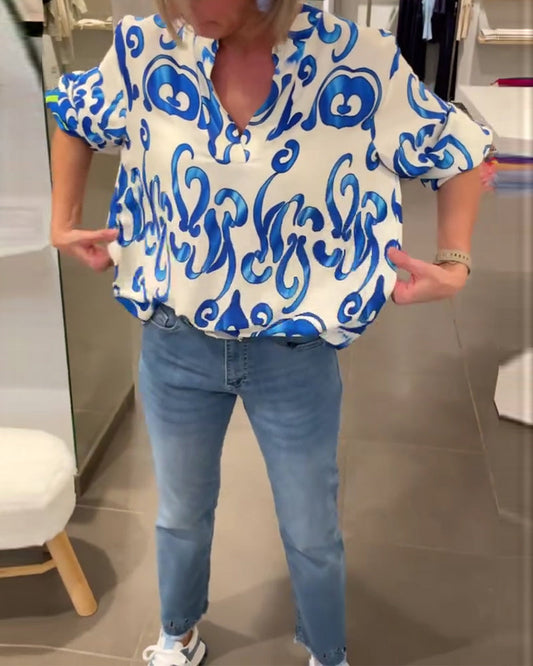 Elegantes langärmliges Oberteil mit bedrucktem V-Ausschnitt