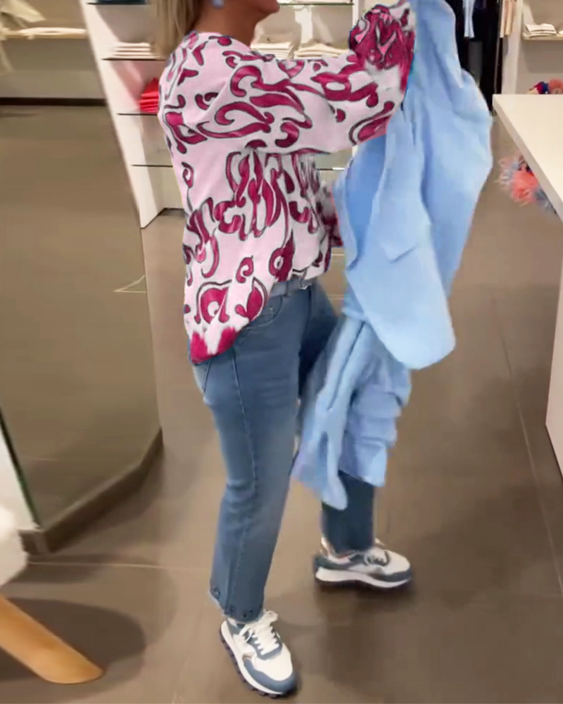 Elegantes langärmliges Oberteil mit bedrucktem V-Ausschnitt