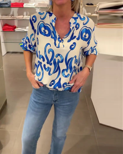 Elegantes langärmliges Oberteil mit bedrucktem V-Ausschnitt