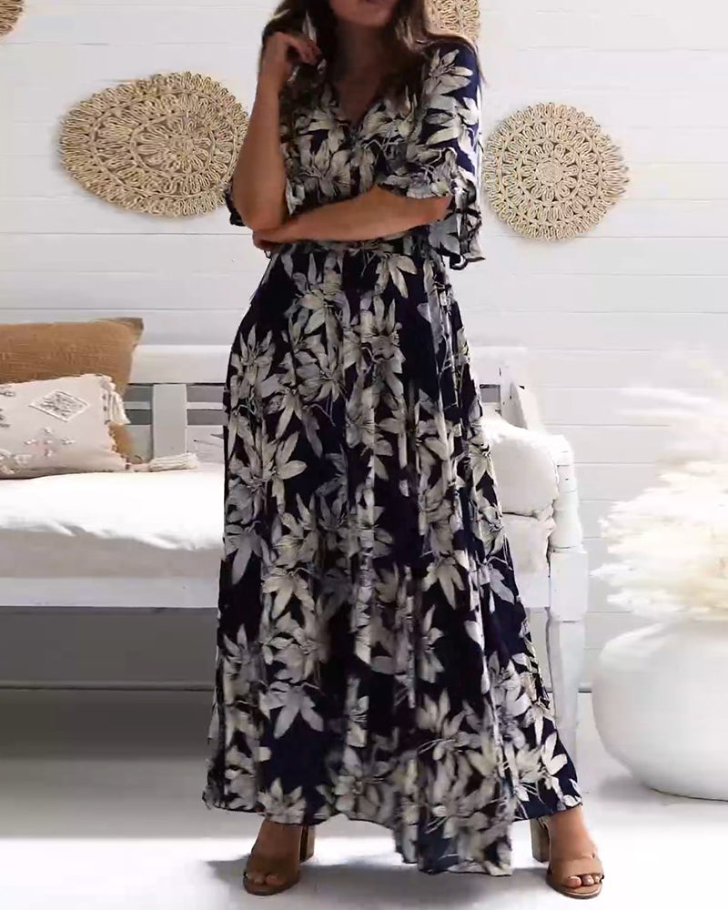 Elegantes florales Kleid mit halben Ärmeln