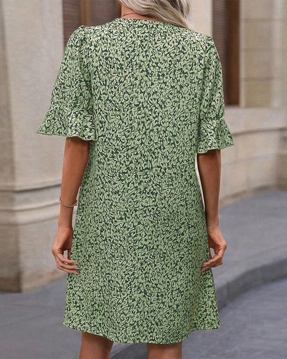 Elegantes bedrucktes V-Ausschnitt-Kleid