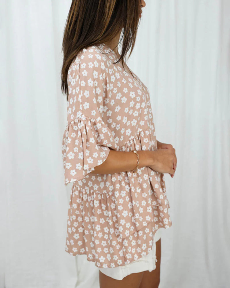 Bluse mit V-Ausschnitt und Trompetenärmeln im Blumenmuster