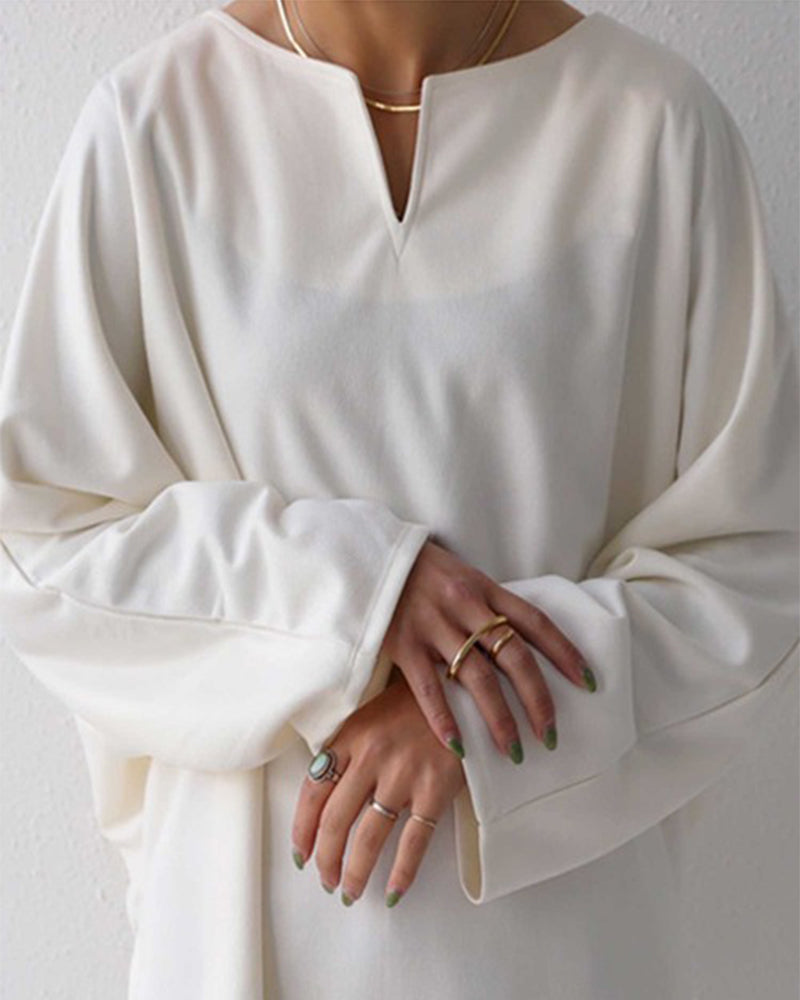 Lockeres V-Ausschnitt-Oberteil in einfarbiger Ausführung