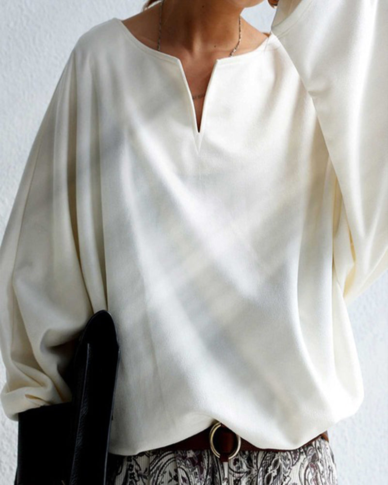 Lockeres V-Ausschnitt-Oberteil in einfarbiger Ausführung