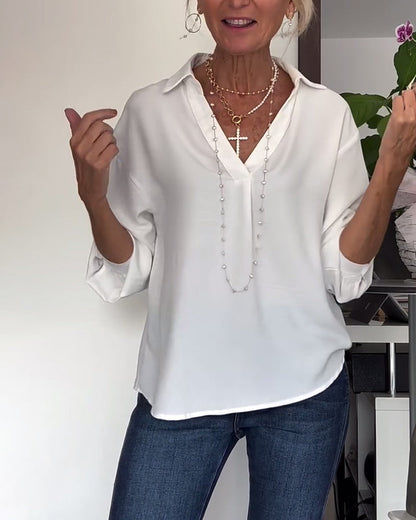 Einfaches Oberteil mit Revers und langen Ärmeln in einfarbiger Ausführung