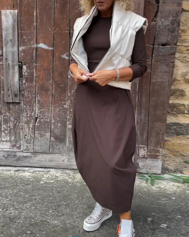 Einfaches, einfarbiges, elegantes Kleid mit langen Ärmeln und Taschen