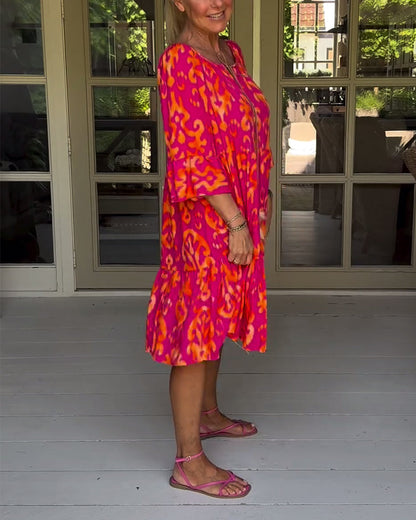 Lockeres Kleid mit Glockenärmeln und Druck