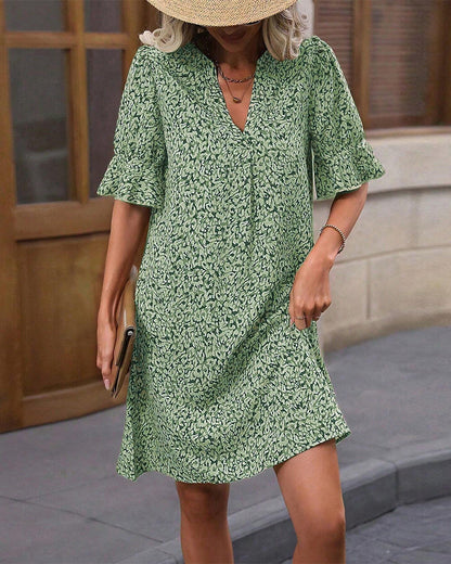 Elegantes bedrucktes V-Ausschnitt-Kleid