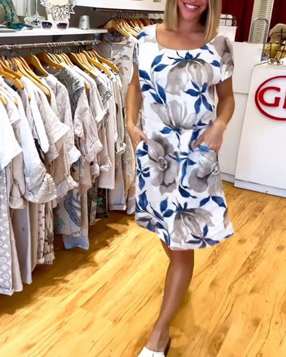 Elegantes kurzärmliges Kleid mit Blumenmuster