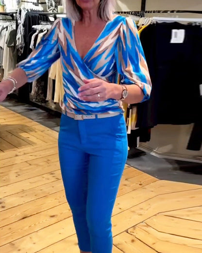 Bedrucktes lässiges tiefes V-Top